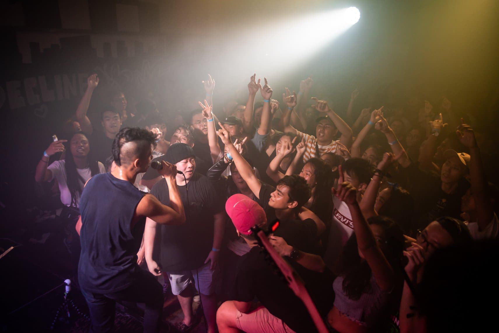 A packed audience watching a live performance